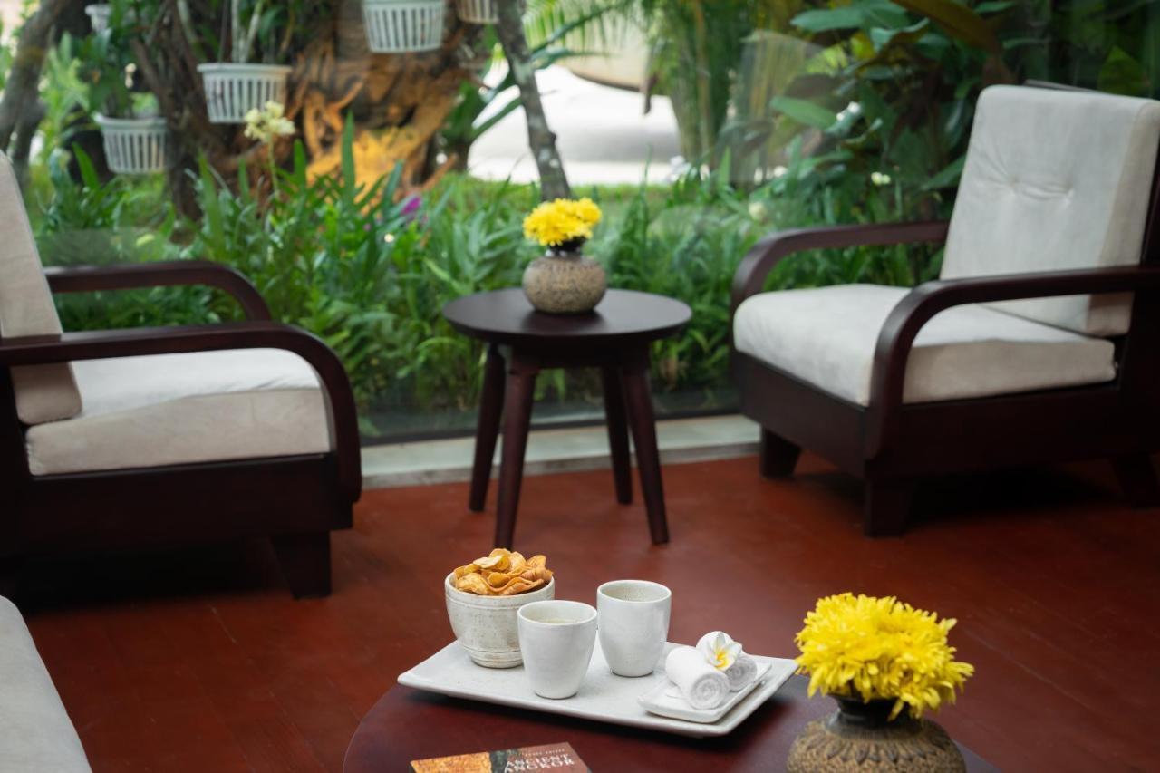 Eightfold Urban Resort Siem Reap Exterior photo A room at the hotel