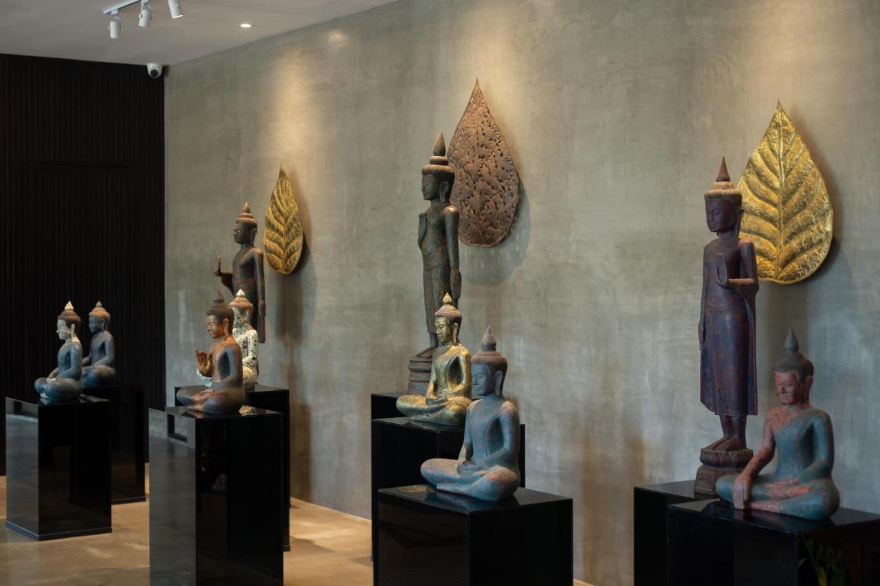 Eightfold Urban Resort Siem Reap Exterior photo A collection of Thai and Laotian art