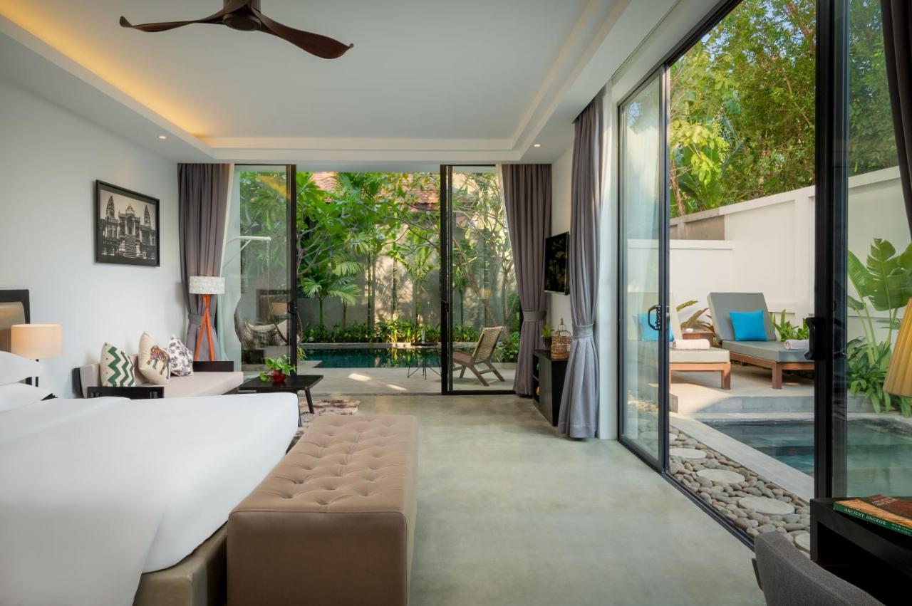Eightfold Urban Resort Siem Reap Exterior photo A pool villa at The Village Phuket