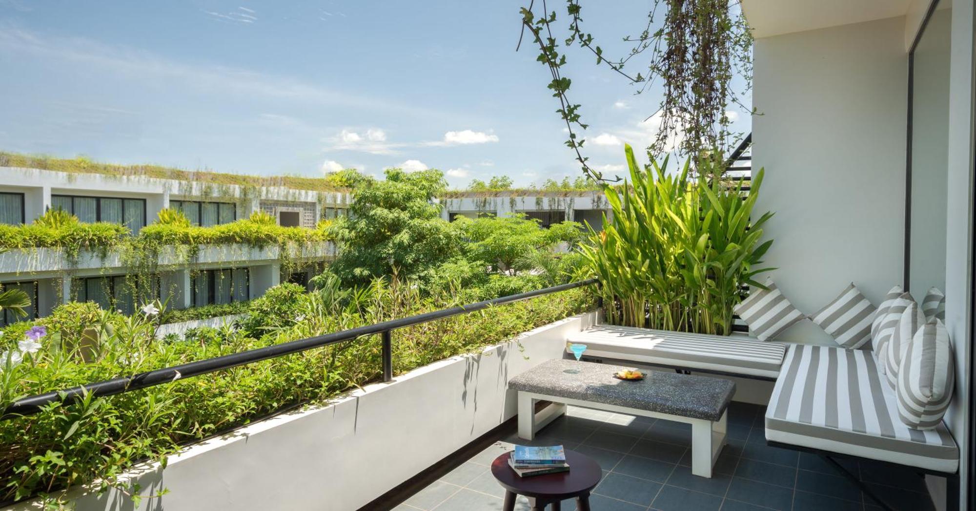 Eightfold Urban Resort Siem Reap Exterior photo A balcony at the hotel